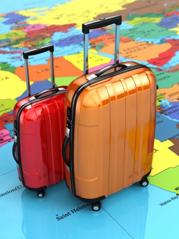 travel-tourism-concept-luggage-world-map-3d